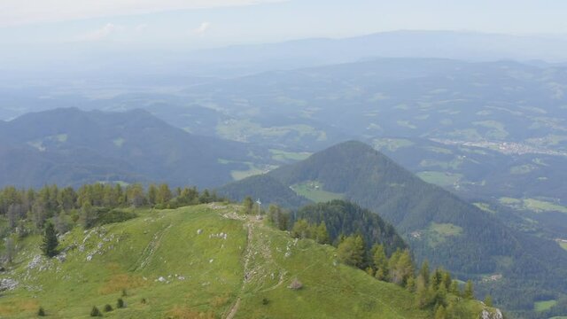 Breathtaking altitude of St Ursula with church cross Slovenia Europe