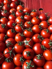 Red cherry tomatoes on the market macro