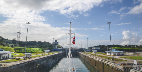 Ship bow view of Gatun locks and control tower panama    canal 