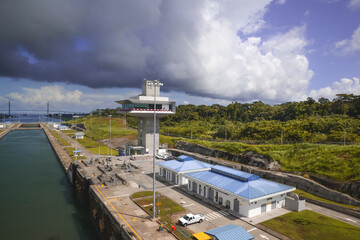 Panama Canal Gatun gate tower  and dramatic clouds 