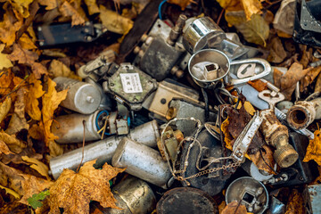 various metal things thrown in the woods