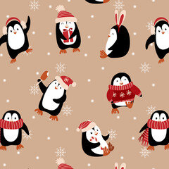 Christmas seamless pattern with cute pengiuns. Holiday print. Vector illustration.