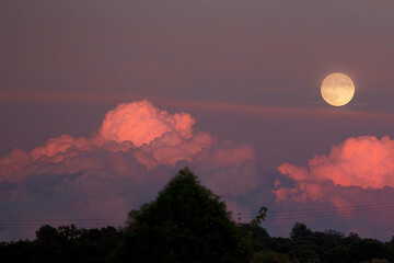 Moonrise with paramount clouds