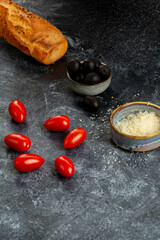 French baguette, cherry tomato, olives and cheese