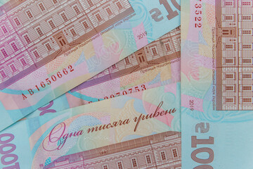 Ukrainian currency. Background of one thousand hryvnia banknotes