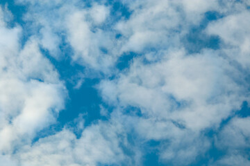 Fluffy cloudscape. Beautiful summer cloud with air space. Clean color backdrop scene. Culumus clouds beauty, fresh panoramic environmental