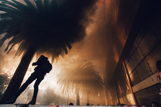 Intense smoke from looting and barricades during a protest in Chile