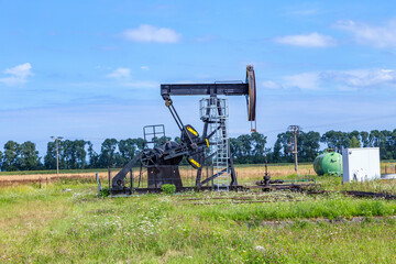 oil rig in Usedom in rural oilfield landscape