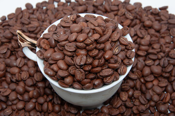 Dark roast coffee beans background, top view
