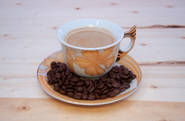 Dark roast coffee beans background, top view