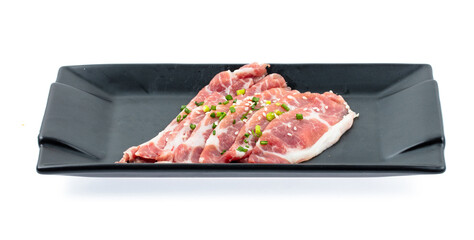 fresh raw pork meat sliced on square plate isolated on white background, shabu, hot pot ingredients