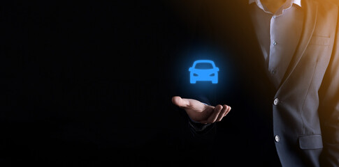 Digital composite of Man holding car icon.Car automobile insurance and car services concept. Businessman with offering gesture and icon of car.