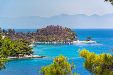 Fototapeta na wymiar Amarantos beach or the three trees, in Skopelos island, Greece.