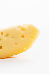 Big holes cheese on white background
