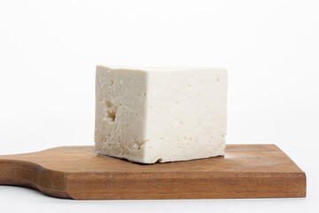White feta cheese on white background