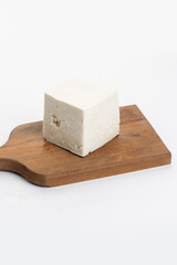 White feta cheese on white background