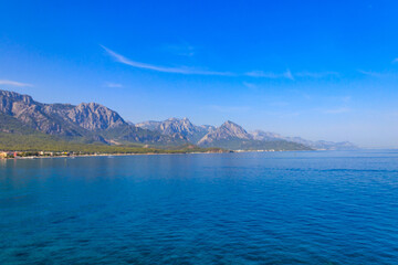 Fototapeta na wymiar View of the Mediterranean sea coast and the Taurus mountains in Kemer, Antalya province in Turkey