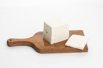 White feta cheese on white background