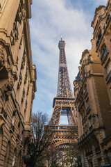 Fototapeta na wymiar Eiffel Tower Between Buildings