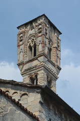 Medieval bell tower Of the Church of San Giacomo in Ossuccio, Lago di Como. Italy.