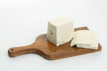White feta cheese on white background