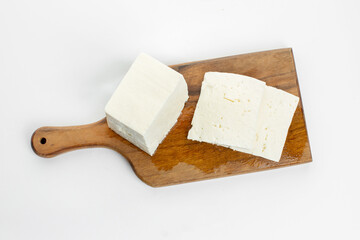 White feta cheese on white background