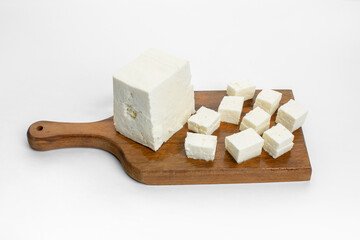 White feta cheese on white background