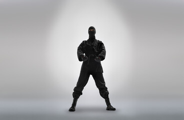 japanese ninja in black uniform, on grey background