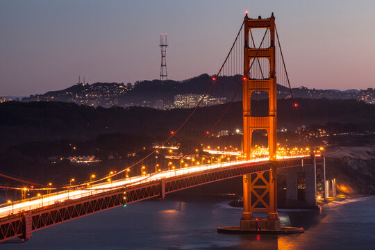 View of Golden Gate Bridge with city at night