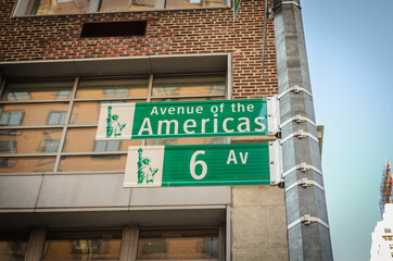 New York City Manhattan Green Street Signs. Avenue of the Americas, 6th Avenue. 