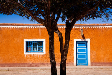 Exterior of house with tree in foreground