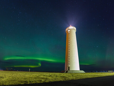 View of Aurora Borealis over Grotta Island Lighthouse at night