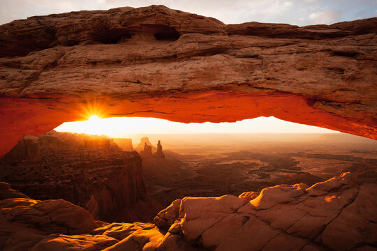 Scenic view of Mesa Arch in Canyonlands National Park during sunrise