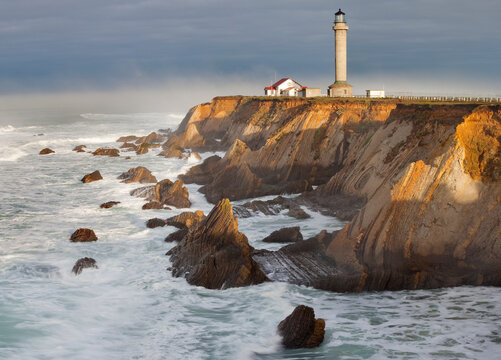 Scenic view of Point Arena Lighthouse against cloudy sky