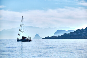 Fototapeta na wymiar Sailing yacht anchored in the bay of mondello at sicily