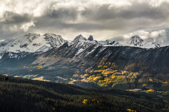 View of clouds over Lizard Head with Mount Wilson, Wilson Peak and El Diente Peak