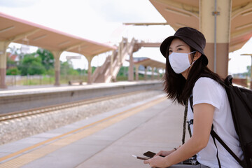woman with a backpack with mask , after pandemic traveling
