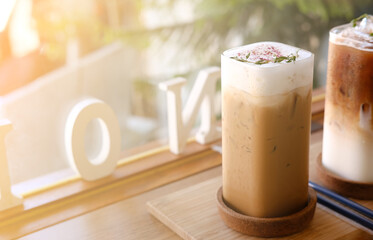 Iced caramel macchiato and Latte coffee in morning,window in background