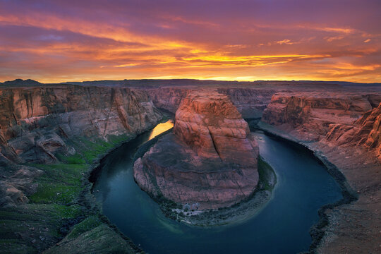 Scenic view of Lake Powell and Horseshoe Bend during sunset