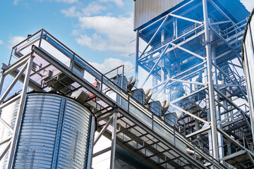 High metal frames in the construction site. Steel structure is under construction. Selective focus.