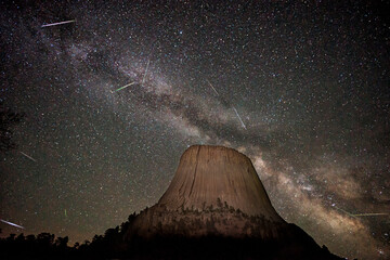 Scenic view of meteor shower above Devils Tower in Black Hills of Wyoming