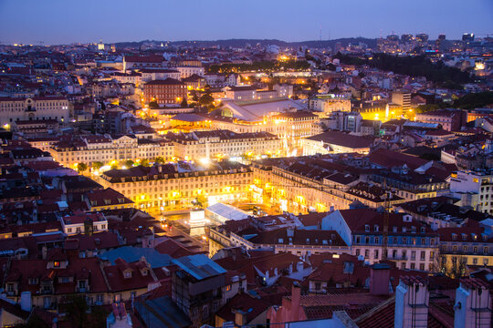 High angle view of illuminated Lisbon cityscape at night