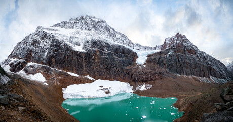 A breathtaking pano of Mount Edith Cavell the Angel Glacier and lake in Jasper National Park.  