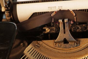 Text me - type-written text, vintage typewriter