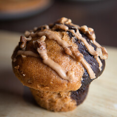 white chocolate chip muffin and liquid caramel wrapped in paper