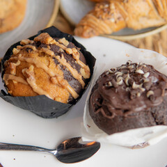 .breakfast of croissants, coffee with milk and pastries
