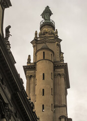 Rio de Janeiro, Brazil - December 26, 2008: El Centro district. Closeup of brown stone Nossa Senhora do Carmo da Antiga church bell tower against silver sky, seen from in 7th Septemver street.