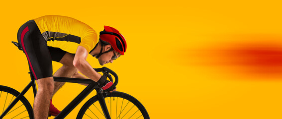 Man racing cyclist on yellow background. Man in yellow cycling jersey - obrazy, fototapety, plakaty