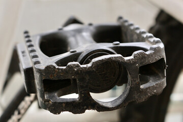 A close-up detailed view of a bicycle pedal.