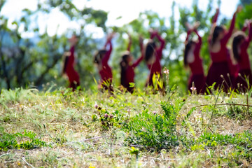 Tatev. Armenia, August 2020: A group of children dressed in traditional Armenian dance costumes perform a traditional Armenian dance .